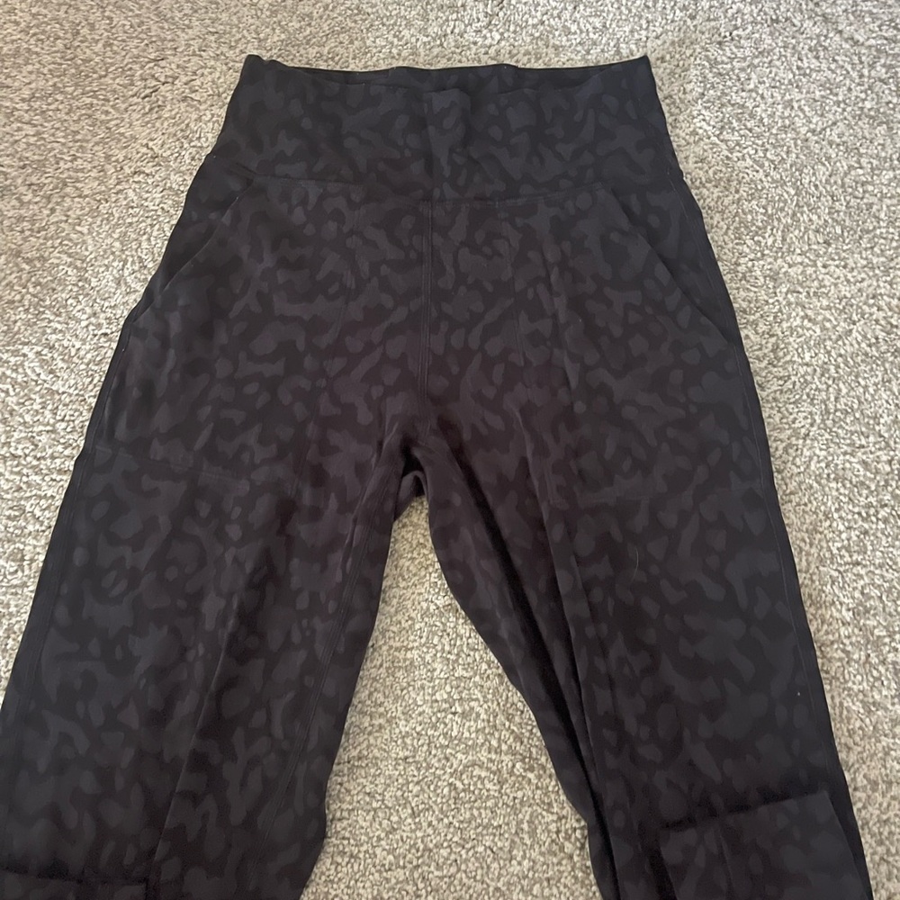 rare lululemon camo/cheetah print joggers size 4